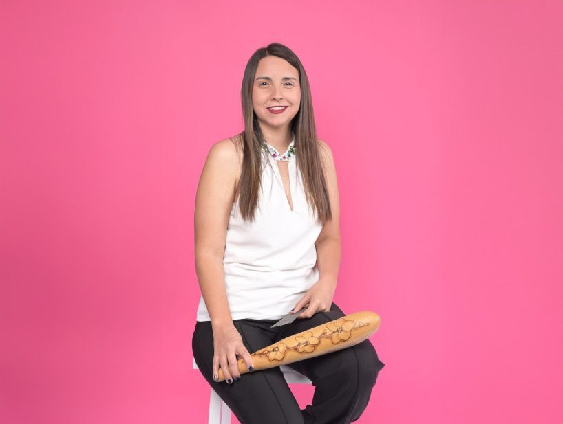 Rosaura Bautista holding a güiro