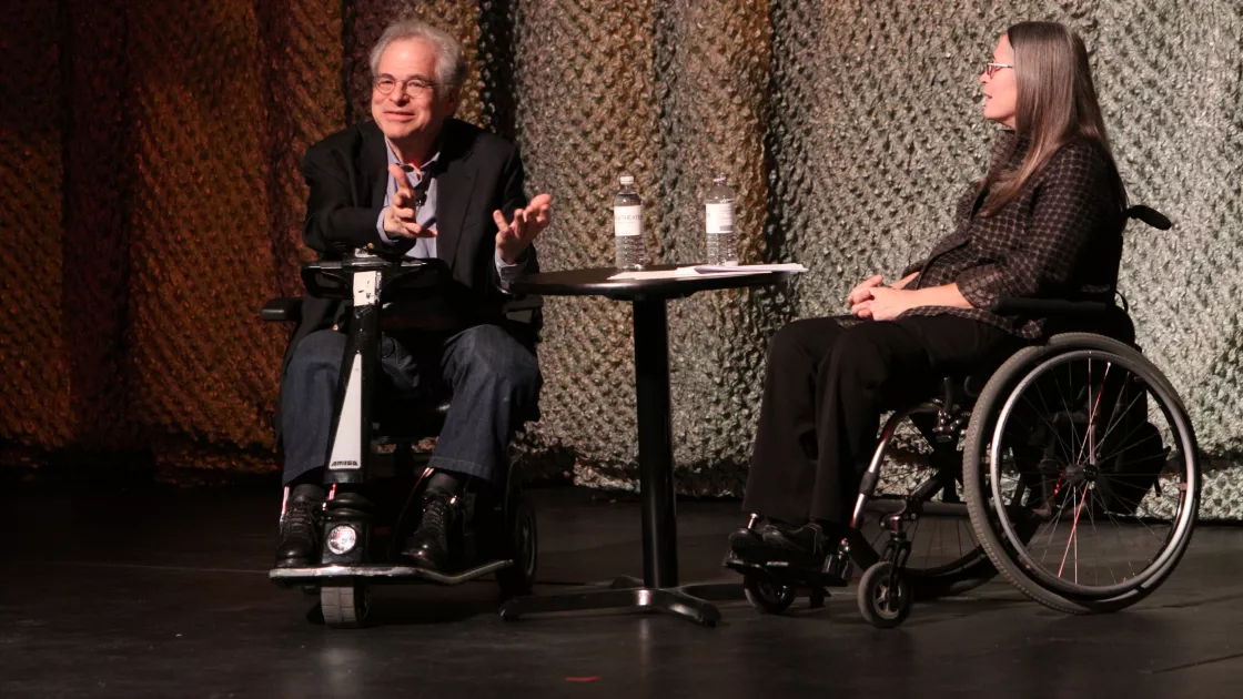 Itzhak Perlman and Marca Bristo engage in conversation on the Harris stage