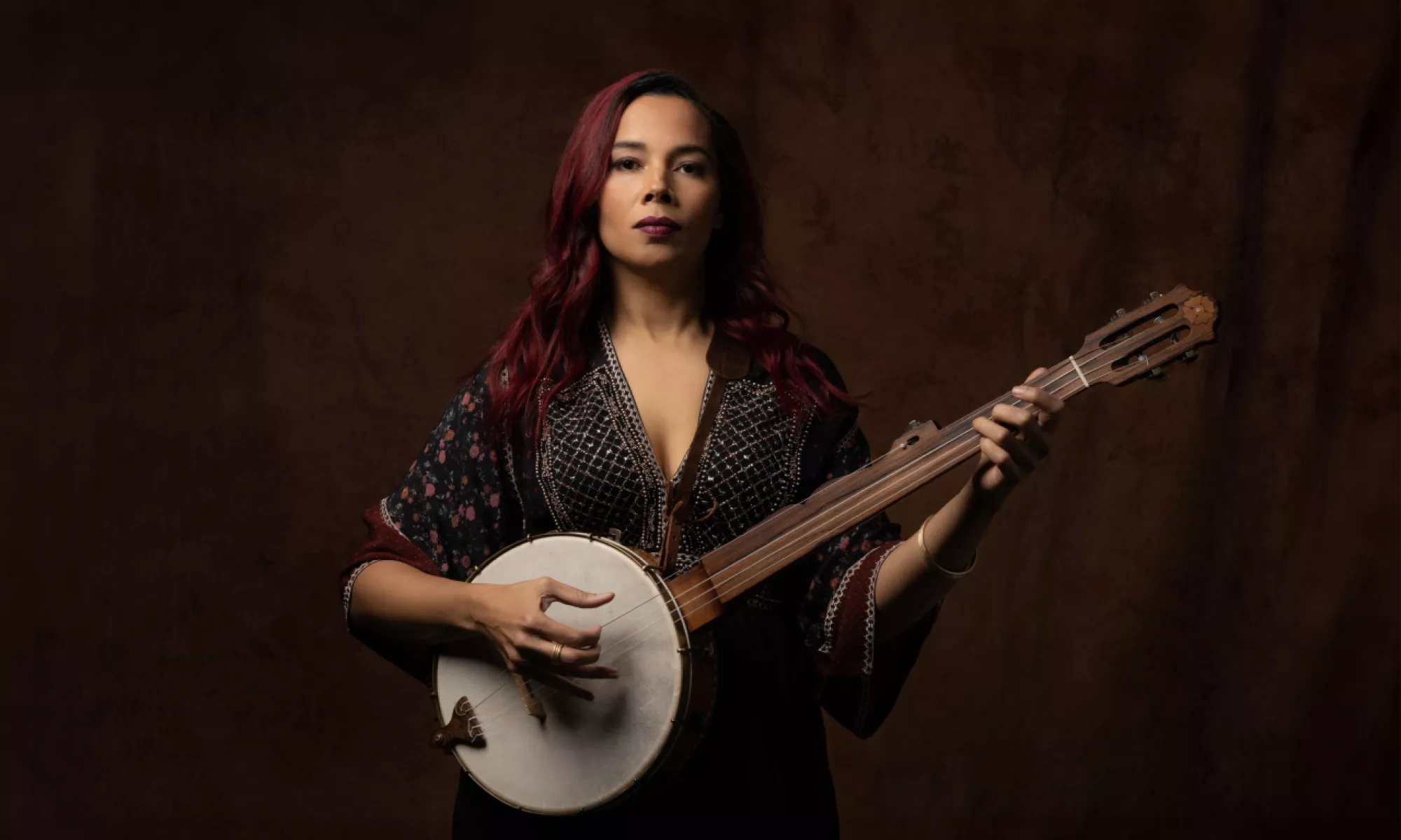 Rhiannon Giddens poses with her banjo