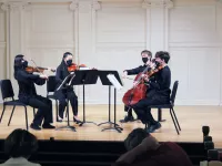 Spektral Quartet guided a string quartet of Music Institute of Chicago students in an hour-long masterclass.