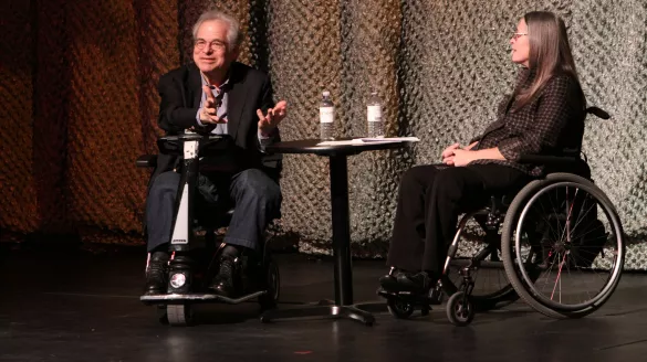 Itzhak Perlman and Marca Bristo engage in conversation on the Harris stage