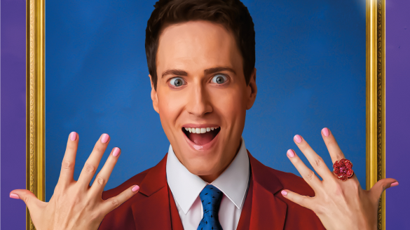 A photo of Randy Rainbow holding up his hands.